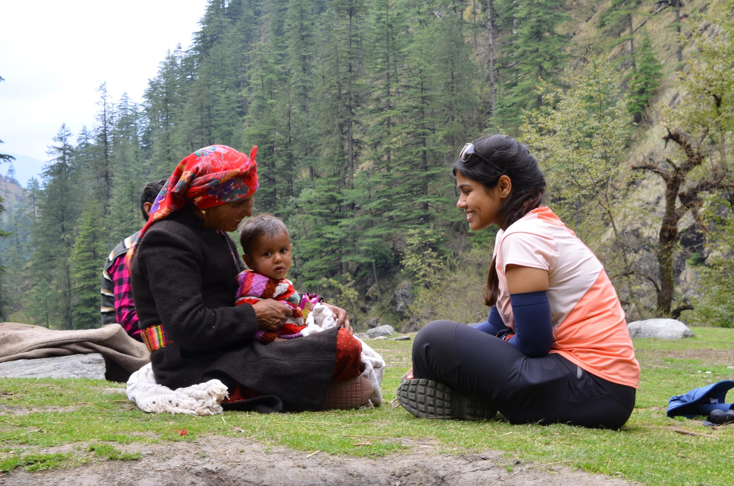 Picturesque view of Har Ki Dun Valley with flowing rivers and alpine forests.