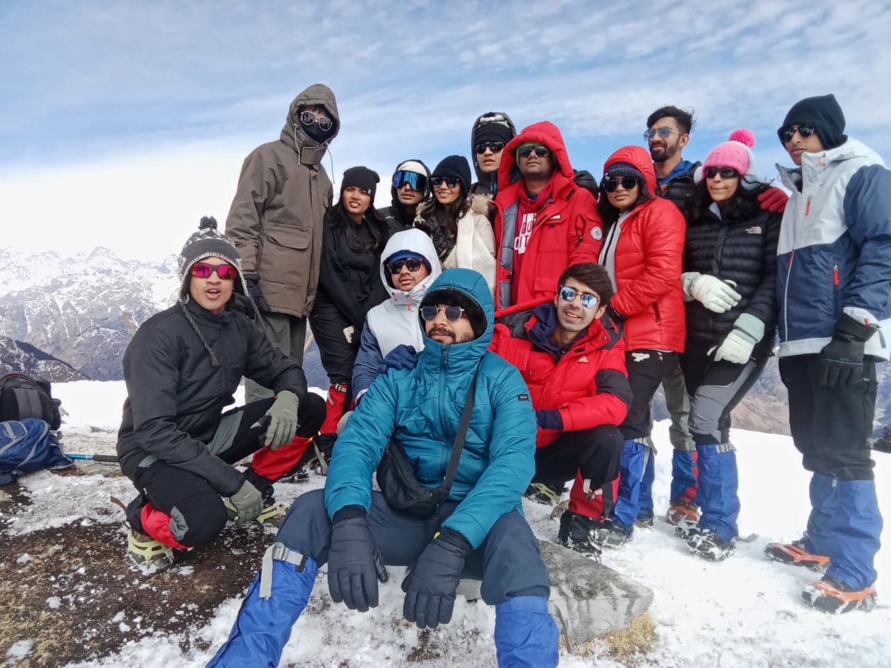 : Trekker walking snow ridge Kuari Pass