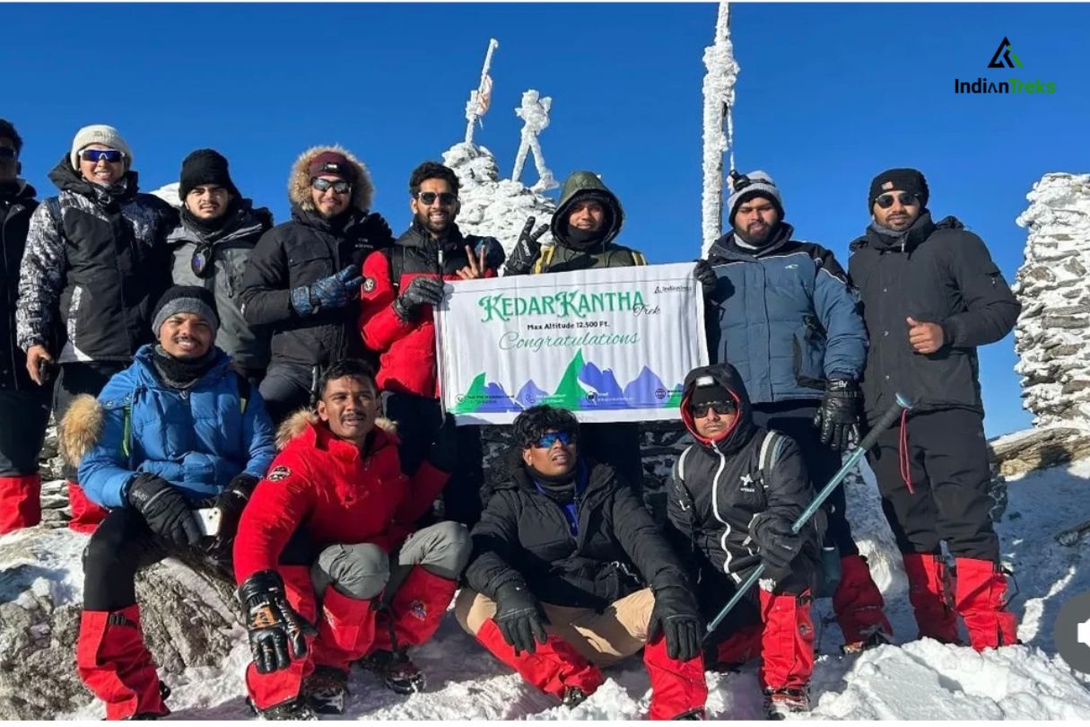 rekkers ascending from Sankri village to Kedarkantha Peak through Himalayan trails with scenic views