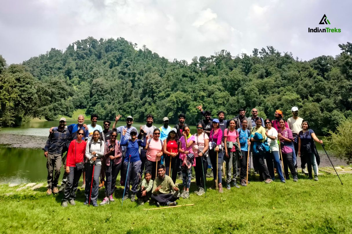 Scenic Deoriatal Lake in Uttarakhand surrounded by dense forest